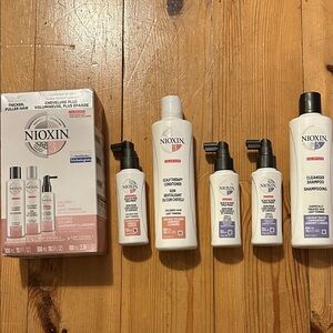 Nioxin Hair Care Set boxed new two pink three purple